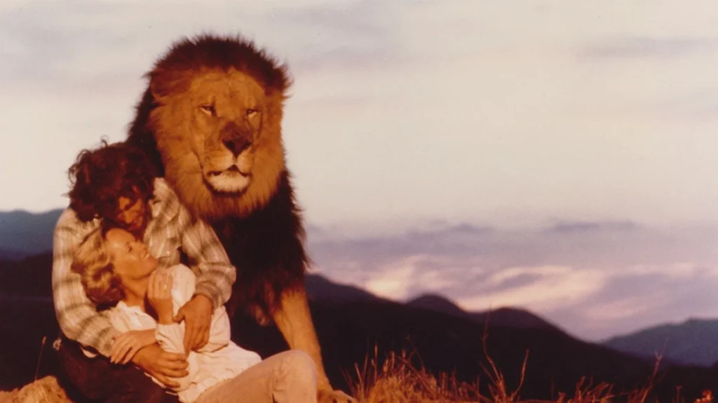 Noel and Tippi with a lion
