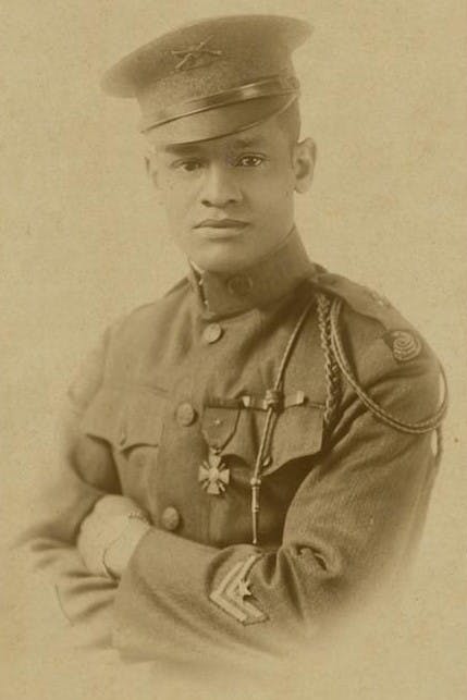 Photograph of Lawrence McVey in uniform wearing the Croix de Guerre medal ca. 1920.