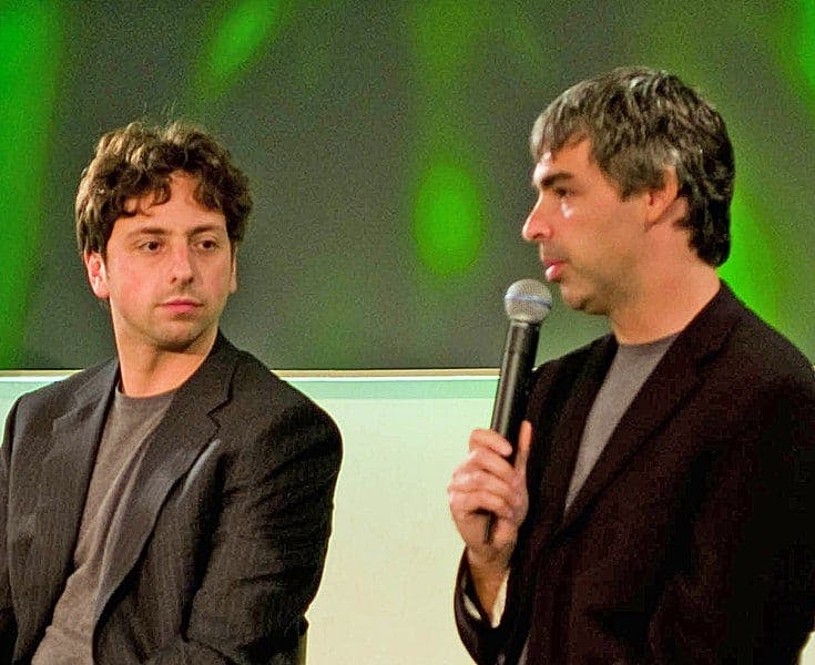 Sergey Brin and Larry Page at a Conference 