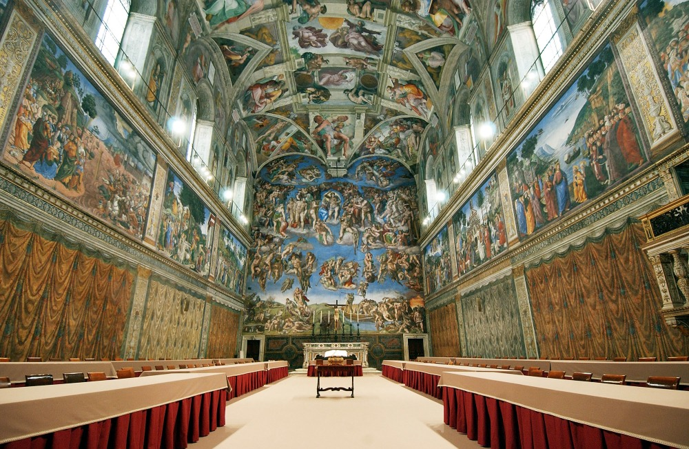 The Sistine Chapel in Vatican City is seen here on April 16, 2005 with tables and chairs set up inside ahead of the papal conclave. (Pool/Getty Images Europe)